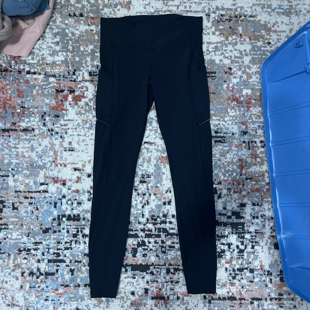 Black Lululemon Leggings with side pockets and back zipper